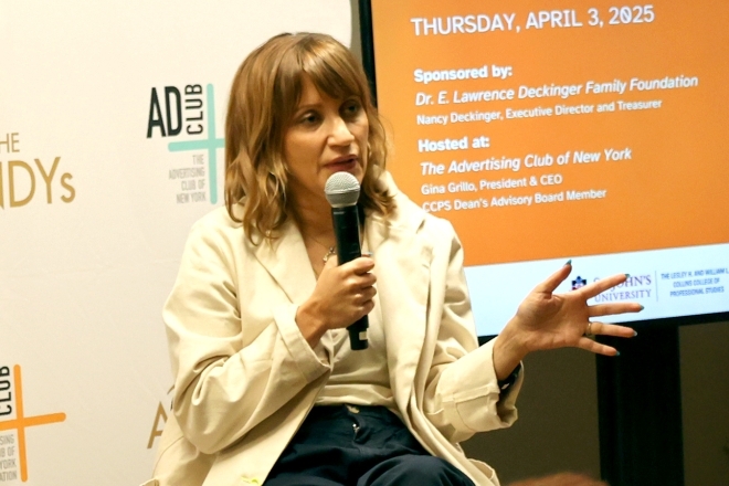 Tiffany Rolfe speaking into a microphone