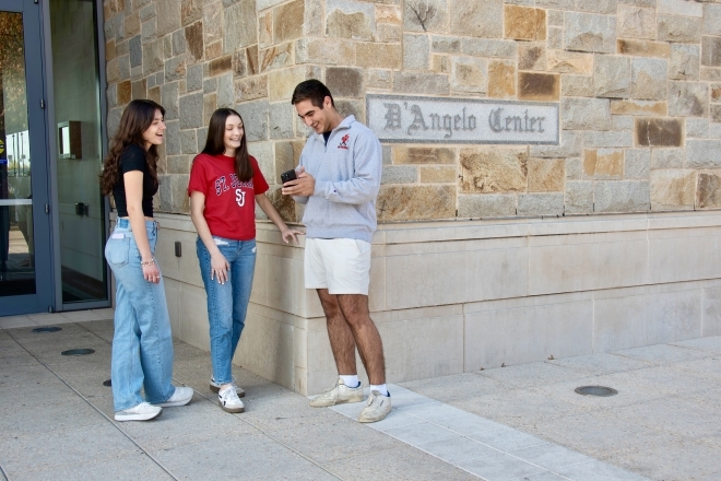 St. John's student conversing together