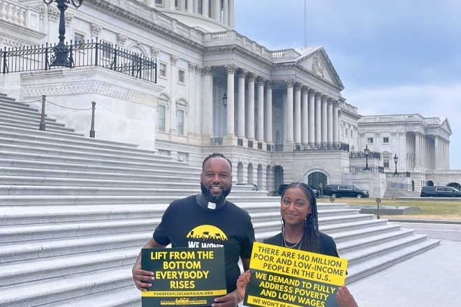 St. John' Student in Washington, DC holding advocacy sign