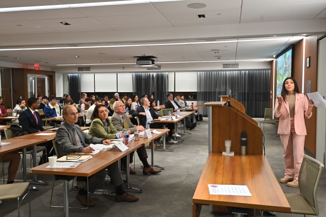 Student presenting to judges