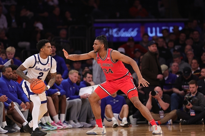 Red Storm basketball player and opponent on the court at MSG