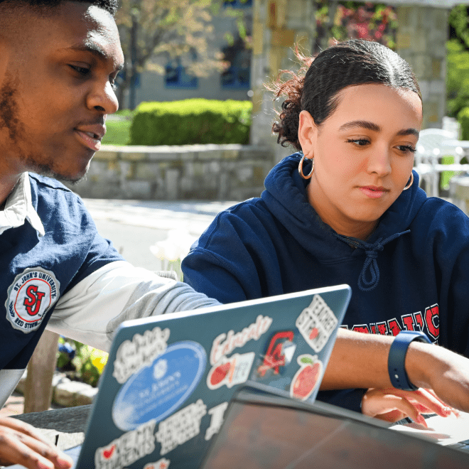 Future college students on their labtops, applying for scholarships 