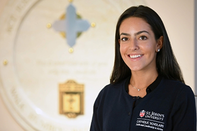 Female student posing in church