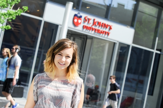 Student Standing outside Manhattan Campus