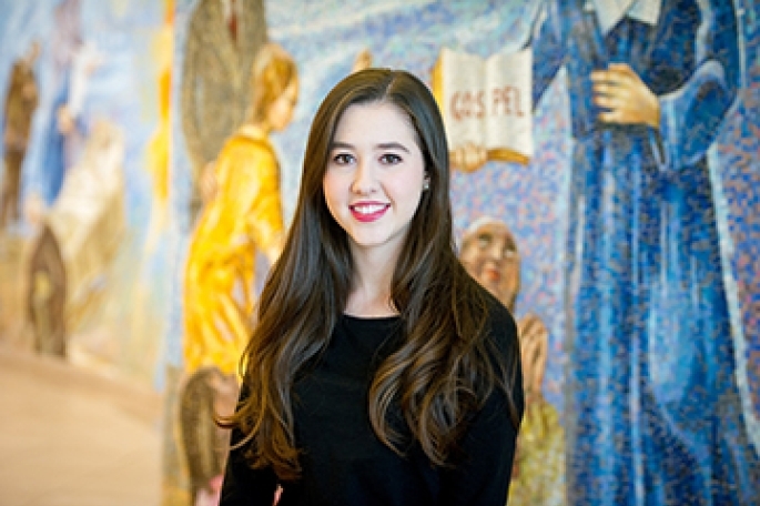 Female student in church lobby