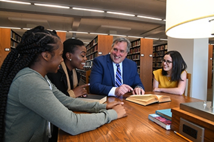 Faculty and Students in library