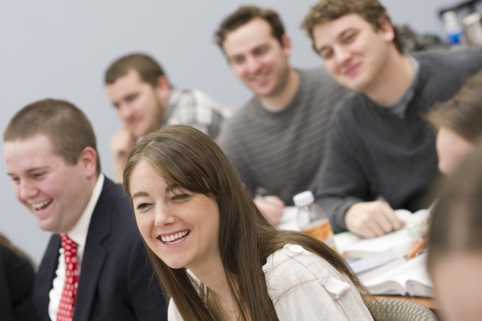 law students sitting in class smilling