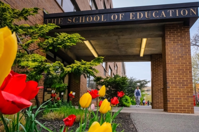 Exterior shot of tulips outside the School of Education