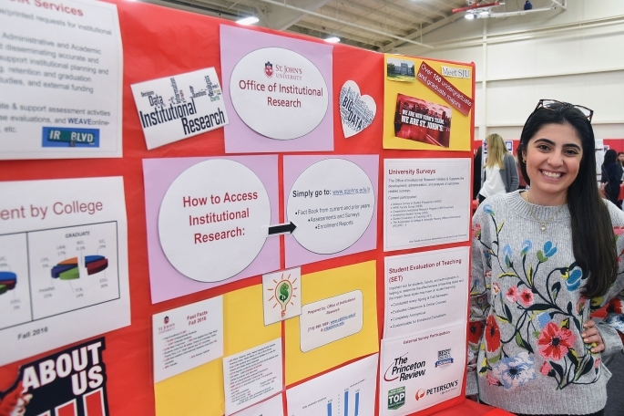 Student and poster at Research Month poster session