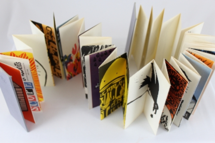 A colorful accordian fold book from Special Collections