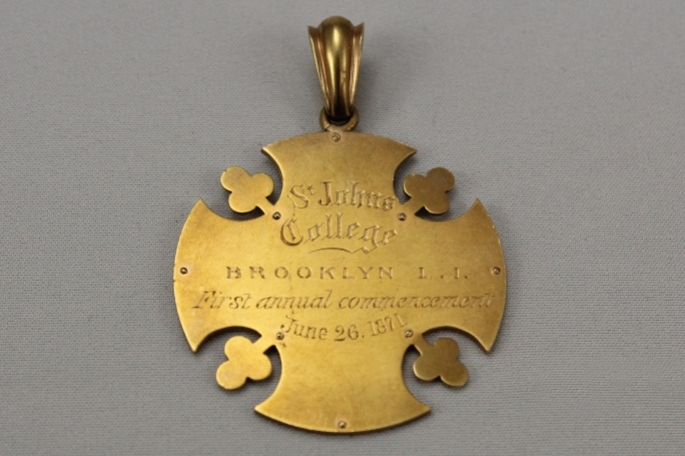 Gold medal from the 1st annual commencement, June 26, 1871