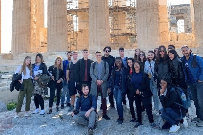 Students gathered in Athens infront of ruins