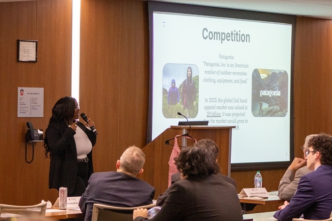 Female student presenting at Business Plan Competition