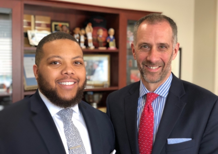 Terrell Hutchins (L) and Dean Michael A. Simons (R)