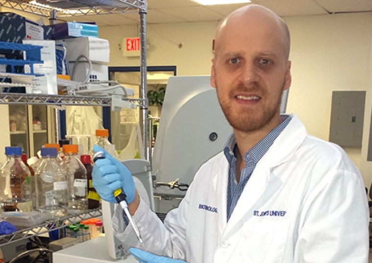 Lucas Montero ’15GP with pharmacy materials