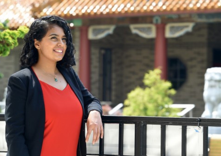 Hira Shafeeq ’09Pharm.D. in front of Sun Yat Sen Hall