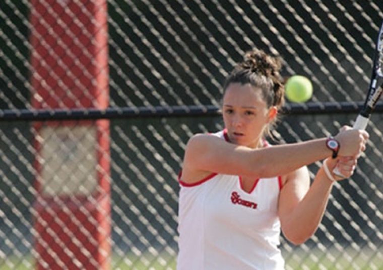 Alison Adamski ‘07CPS playing tennis
