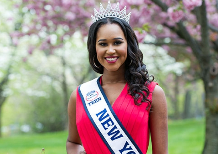 Andreia Gibau ’18CPS with tiara and sash