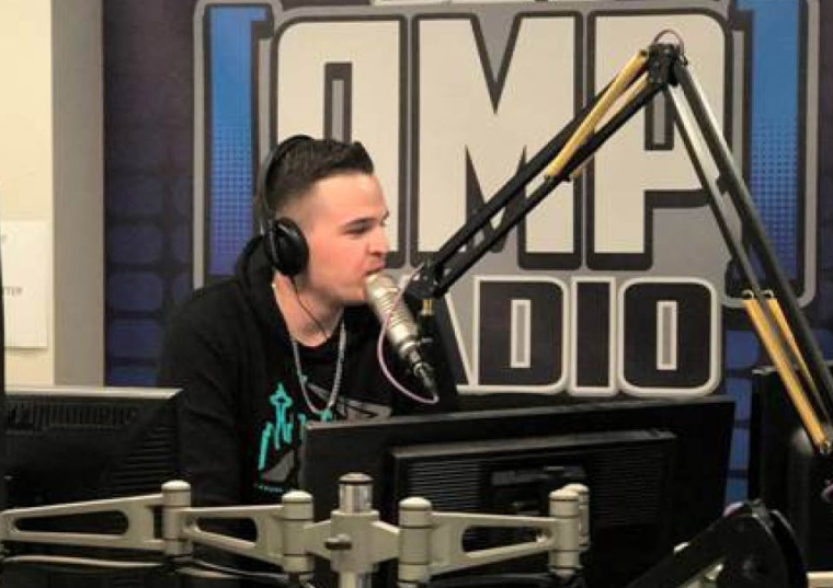 Michael McGinn ‘13CPS at radio mic