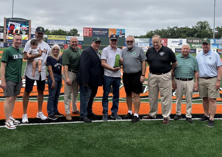 James Lally and Whitey Ford's family on baseball field