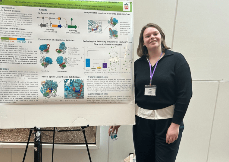 Student in front of a presentation board 