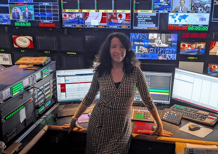 Women in front of computer monitors room 