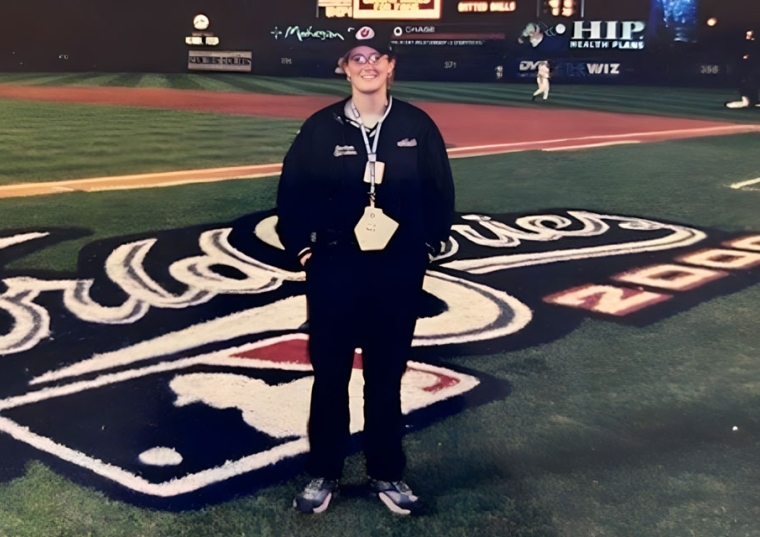 St. john's alumna on met's stadium field