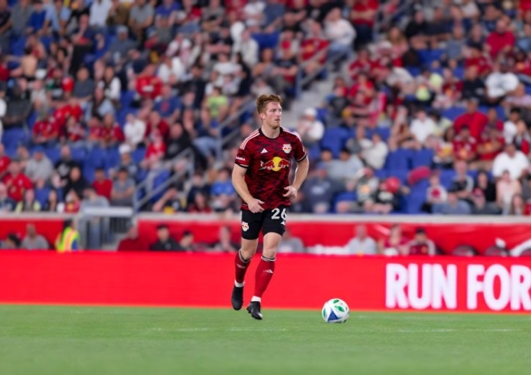 Timothy Parker, M.B.A. ’15TCB photo playing soccer