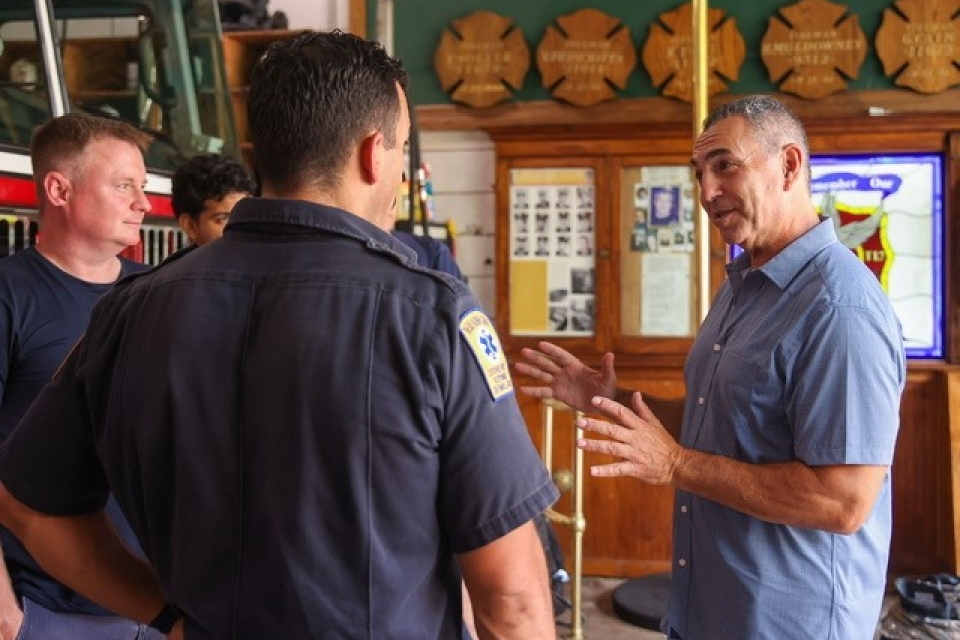 John Franco Talking to Firefighters at a Fire station