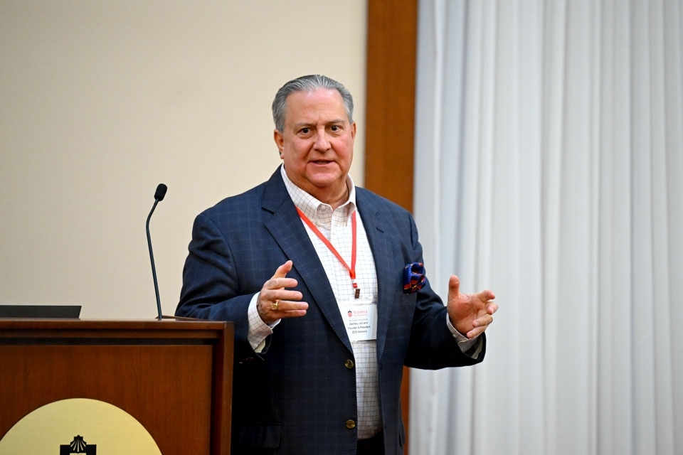 Man speaking during lecture