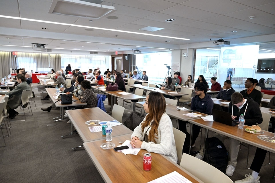 overview of people sitting at tables