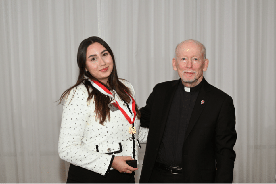 Student winning an achievement through St. John's President's Society