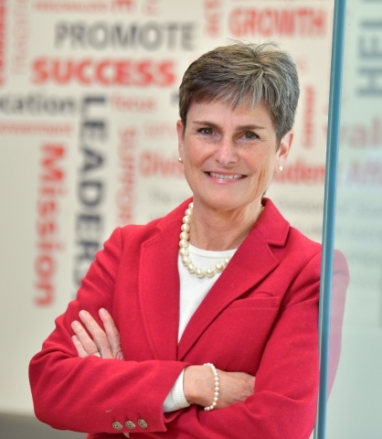 Karen Simons standing in a doorway