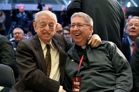 Fr. Richard Rock with Lou Carnesecca at SJU Basketball Game