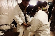 William Hong is fitted for his PPE