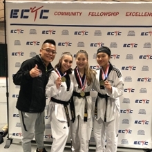Eagles TKD students and founder posing for a photo