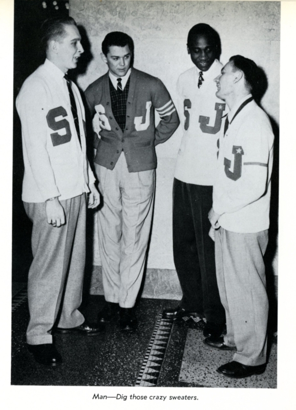 A group of students at the downtown Brooklyn campus wearing classic 'SJ" varsity sweaters in 1954.