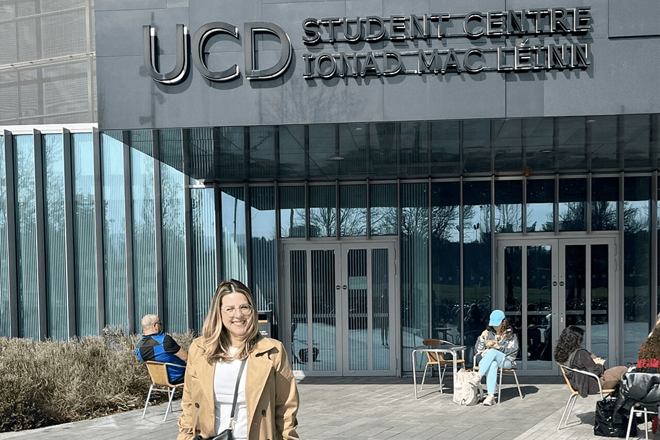 Katherine Aquino standing outside the writing center at University College Dublin.