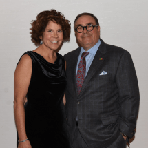 Photo of Carmine and Lynda Rubino standing together.