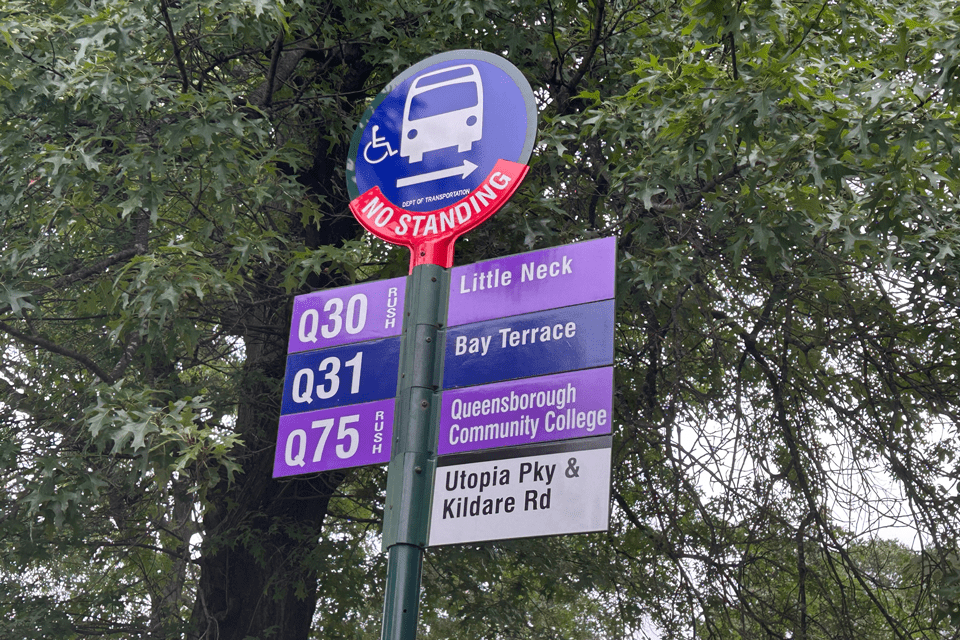 Q30 and Q75 Utopia/Kildare bus stop signs 