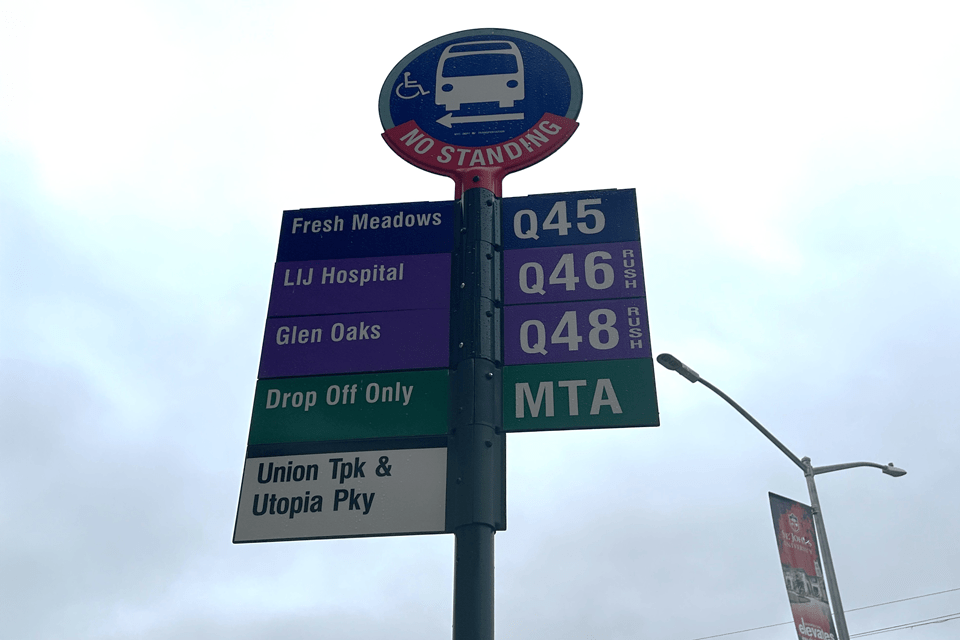 Q46 and Q48 bus stop signs