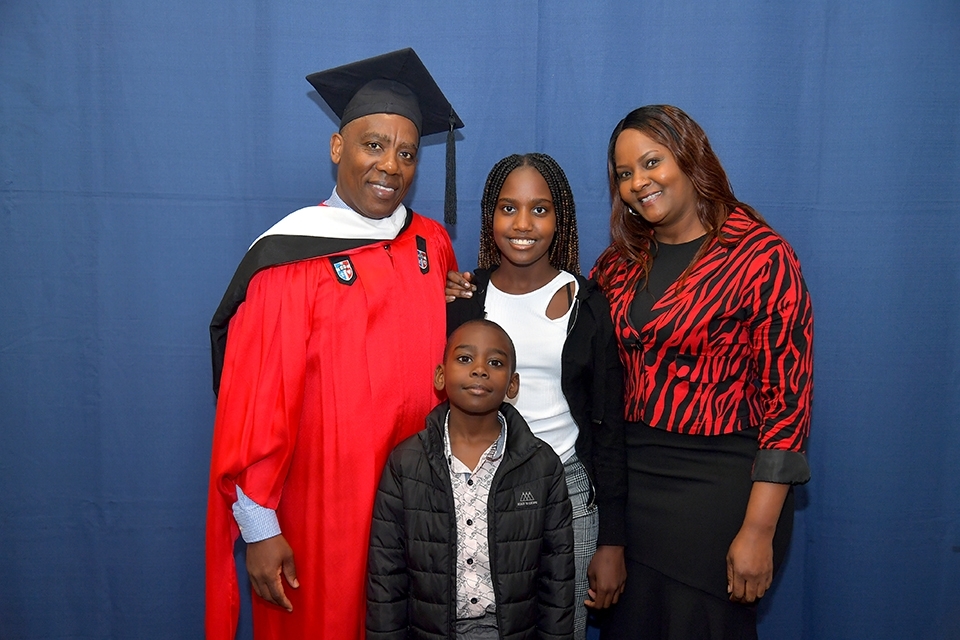 David Gachigo with his wife and two children
