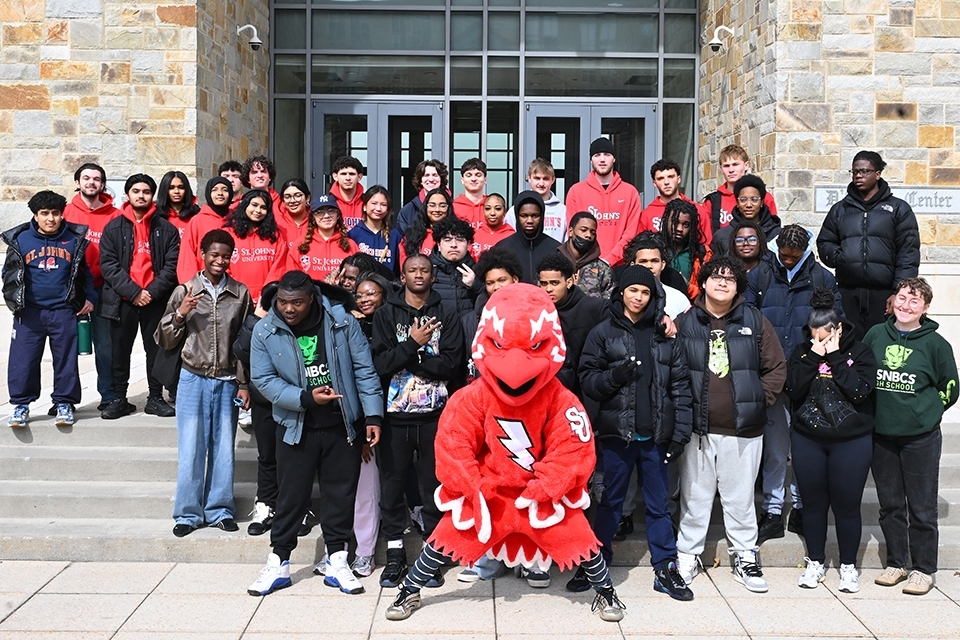 High school students and Johnny Thunderbird outside of DAC