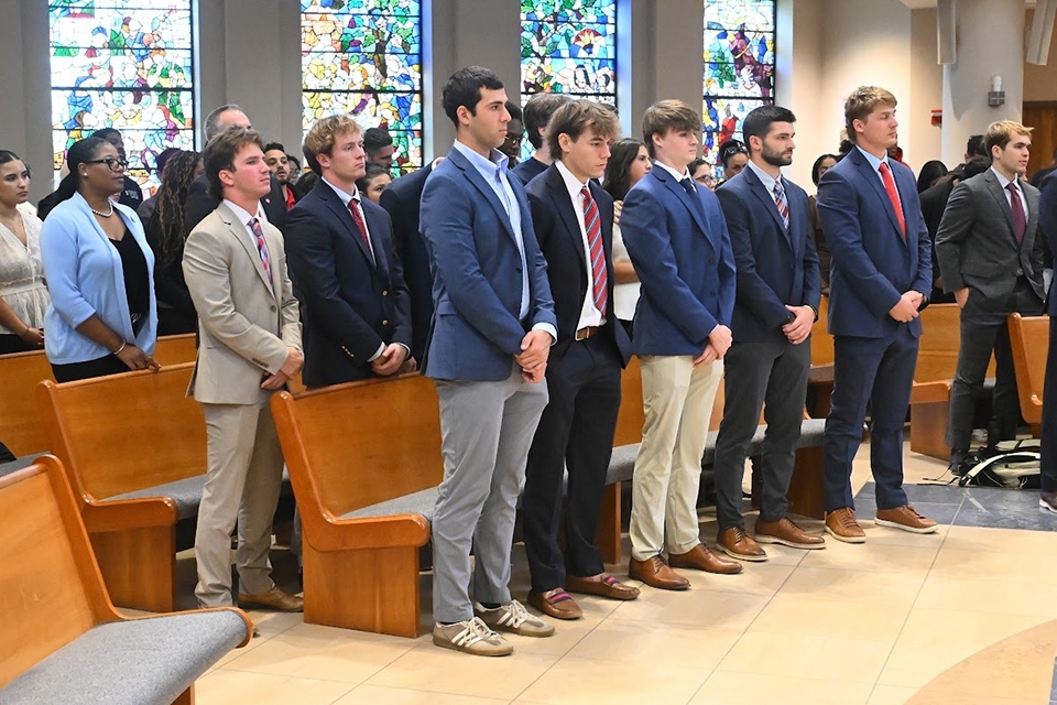 Students at SOoemnity Mass